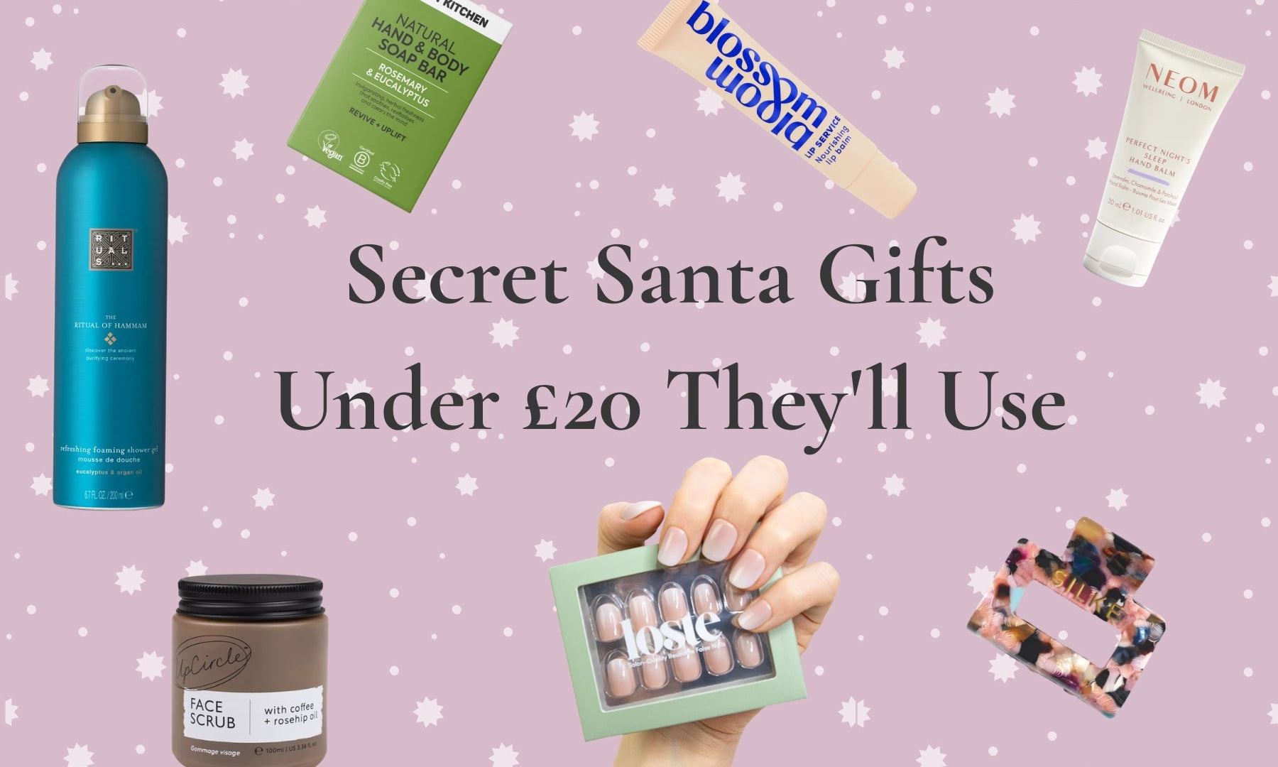 Secret Santa gifts under £20 they'll use: a hand holding a Loste press-on nail set, with Rituals shower gel, a Beauty Kitchen soap bar, Bloom & Blossom lip balm, NEOM hand balm, UpCircle face scrub and a SILKE London claw clip on a lilac starry background