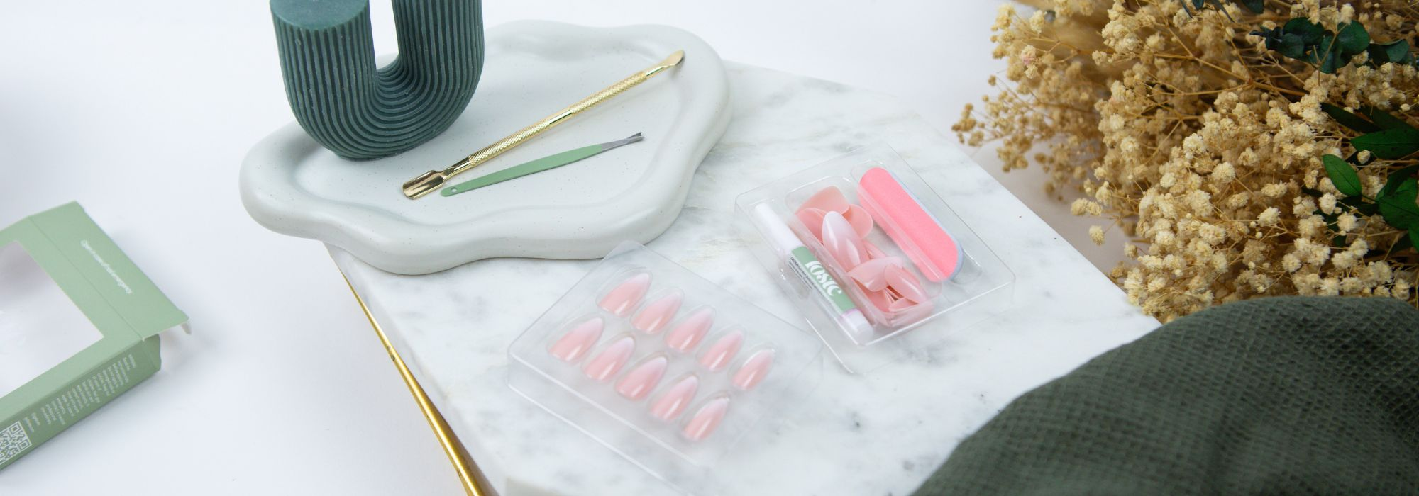 loste false nail glue and sticky tabs