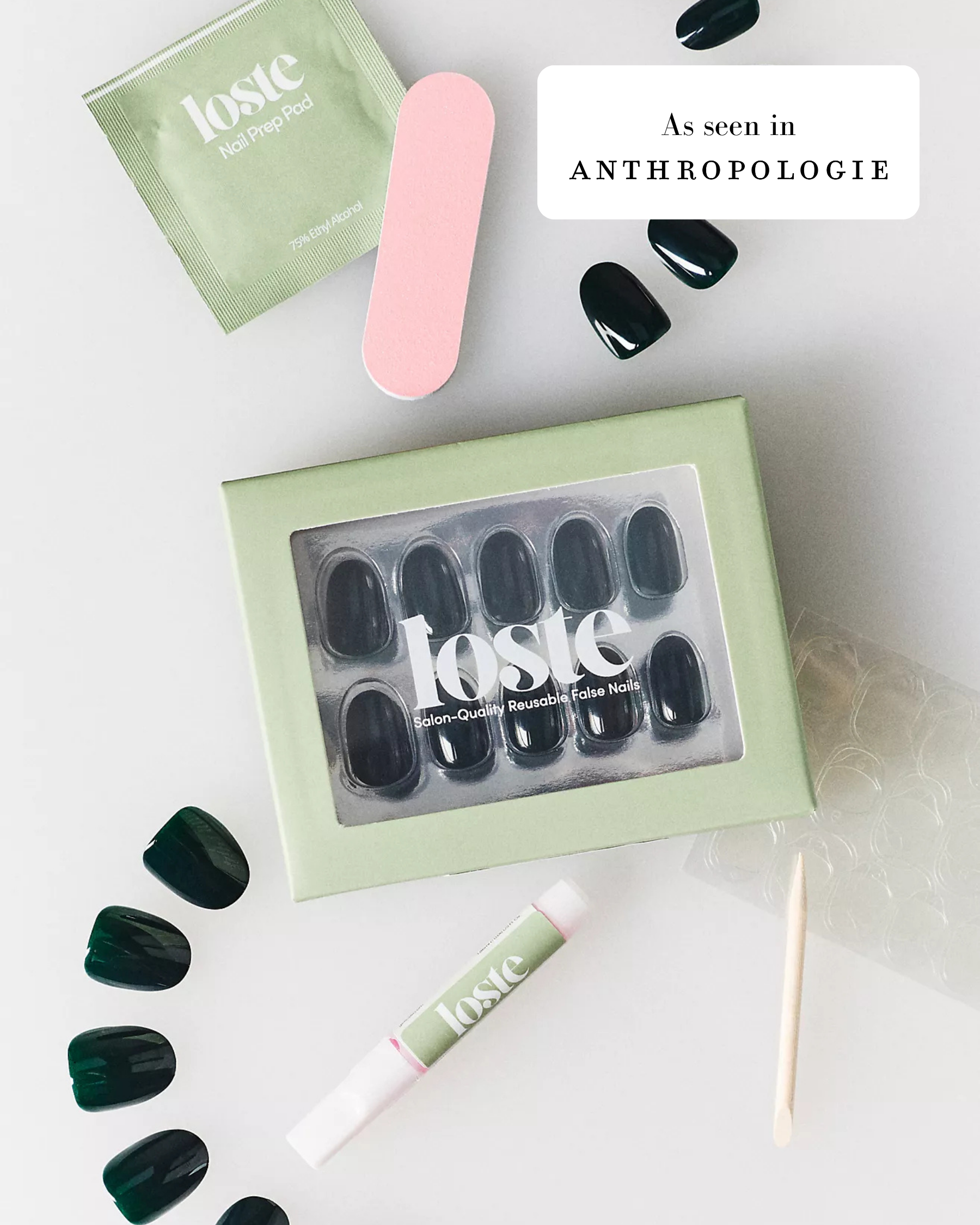 A flat-lay featuring a box of Loste press-on nails